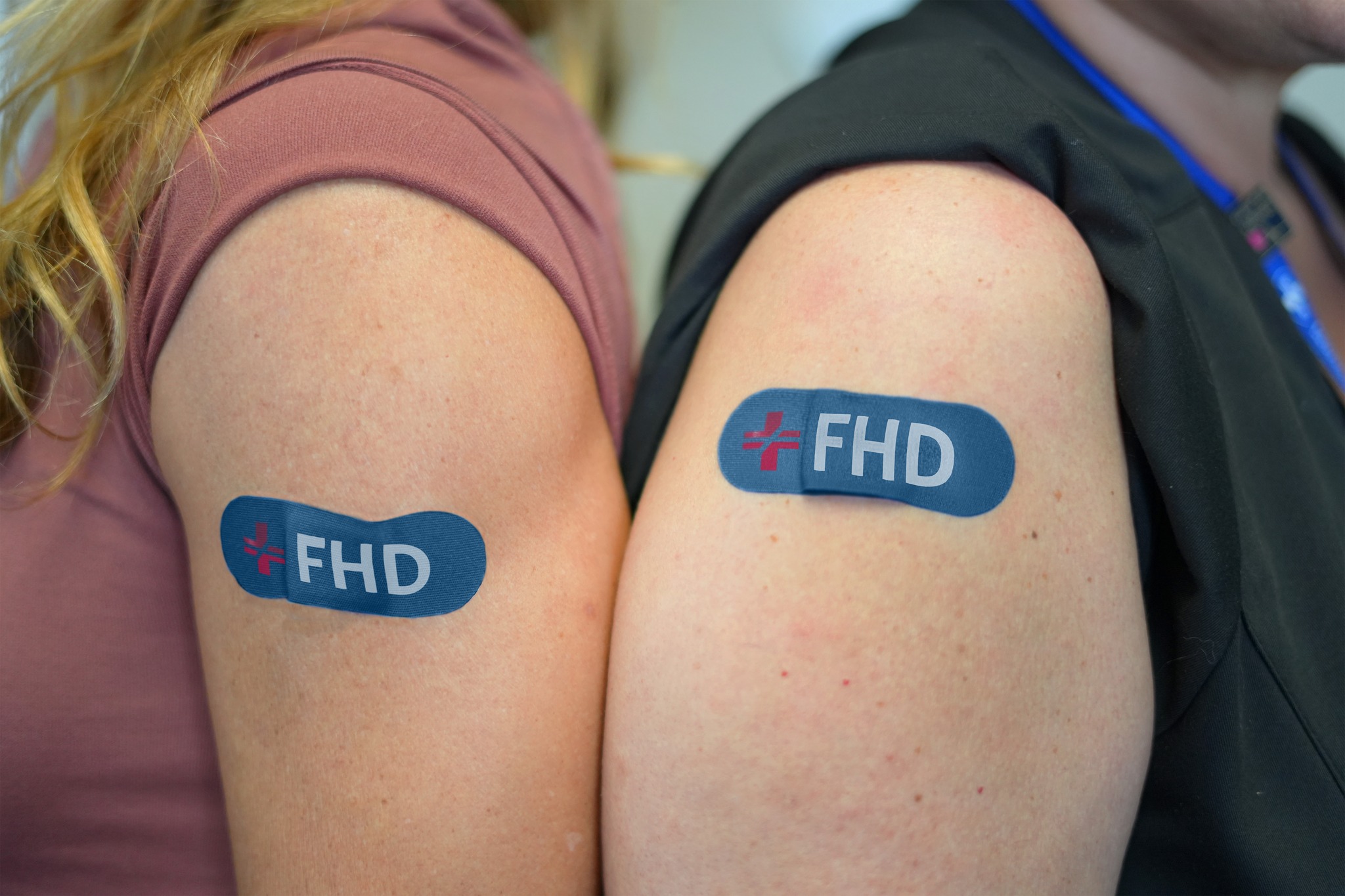 arms with fhd bandaids