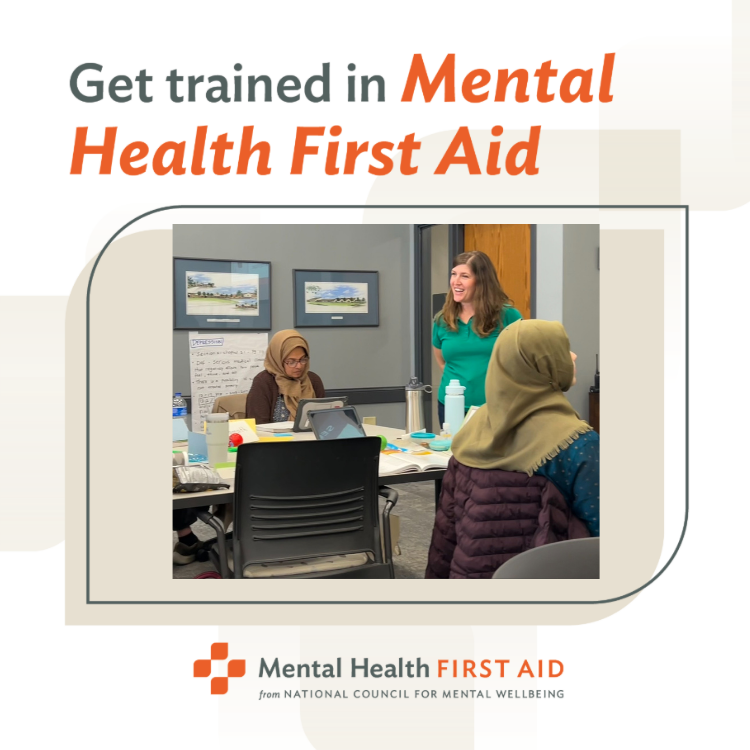 Get trained in Mental Health First Aid, includes image of instructor teaching group of adults.